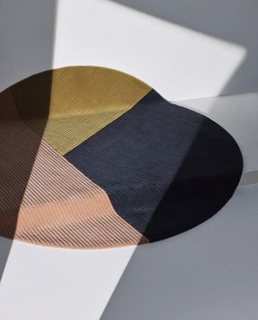 Northern Row rug circular trio