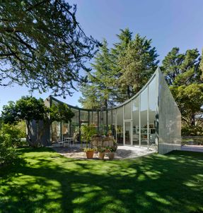 Single House Reusing A Former Water Cistern