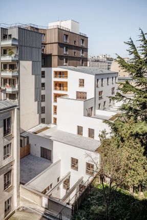 Garage Building into 63 Apartment Building