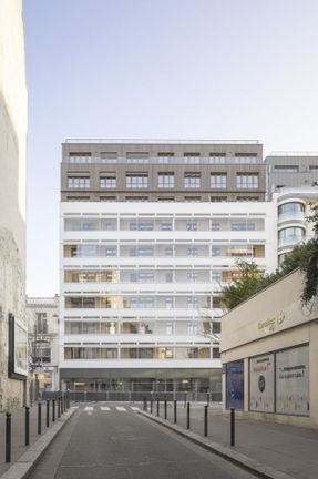 Garage Building into 63 Apartment Building