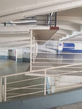 Garage Building into 63 Apartment Building