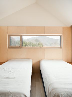 Two Gabled Volumes, One Landscape
