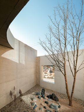 Two Gabled Volumes, One Landscape