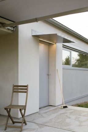 Modular House With A Sloping Facade