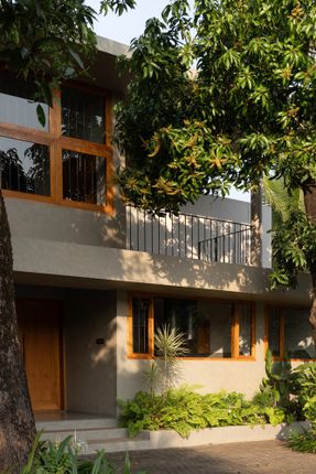 House Beyond The Mango Trees