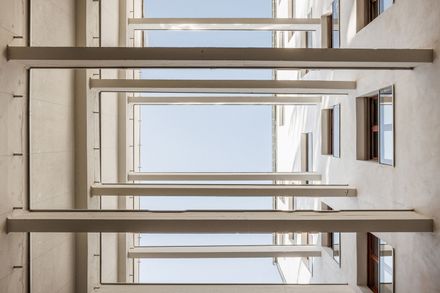 Garage Building into 63 Apartment Building