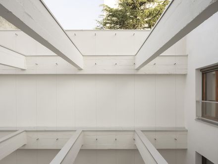 Garage Building into 63 Apartment Building