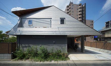 Two Large Roofs Leaning Together