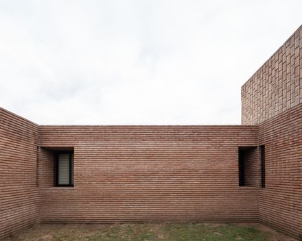 Three Courtyards House