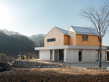 Two Gabled Volumes, One Landscape