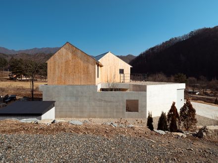 Two Gabled Volumes, One Landscape