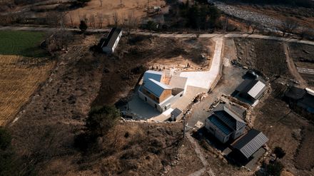 Two Gabled Volumes, One Landscape