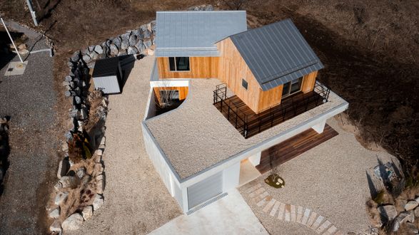 Two Gabled Volumes, One Landscape